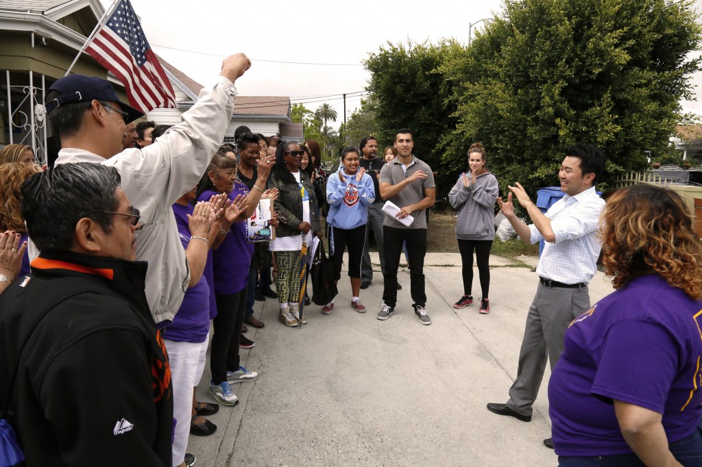 Los Angeles City Council candidate David Ryu, right, stands with a group of about 30 supporters and volunteers this weekend. (Korea Times)