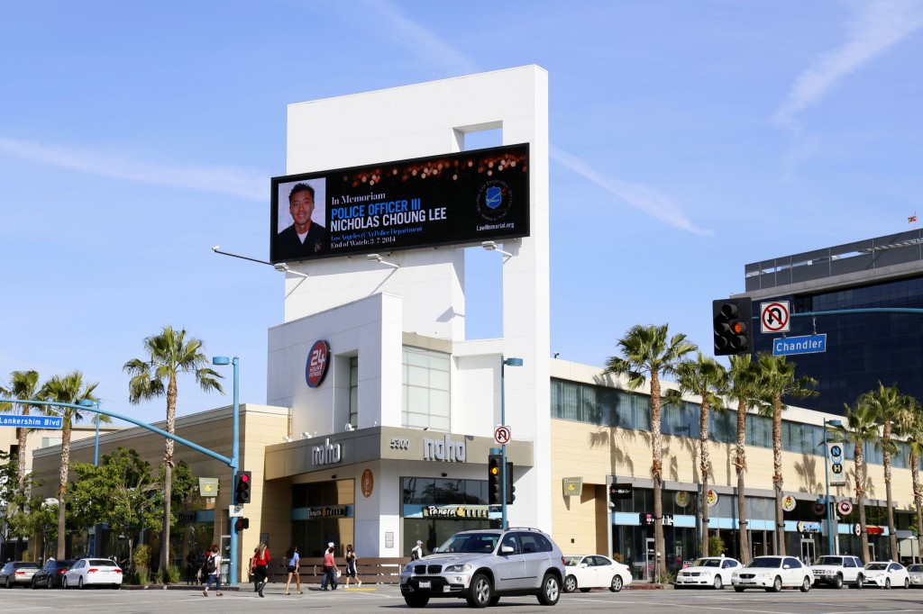 A billboard commemorating LAPD Officer Nicholas Lee is seen at the corner of Chandler Blvd. and Lankershim Blvd. in North Hollywood. (Korea Times)