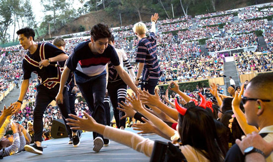 Members of Got7 greet fans during their first performance at the Hollywood Bowl Saturday for the 13th Korea Times Music Festival. (Korea Times)