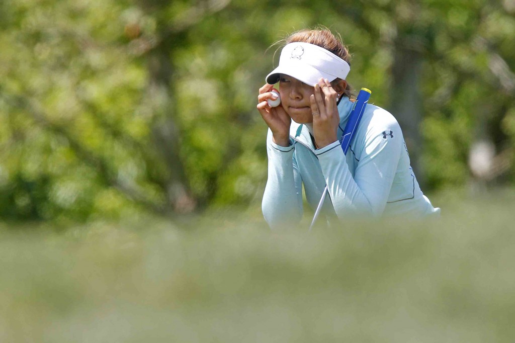 Alison Lee lines up a putt on the 15th hole during the second round of the Kingsmill Championship LPGA golf tournament in Williamsburg, Va., Friday, May 15, 2015. (Jonathon Gruenke/The Daily Press via AP)