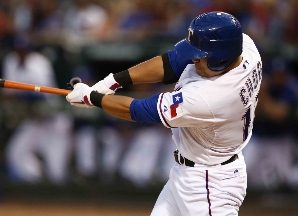 Texas Rangers' Shin-Soo Choo (17) connects for a double against the Oakland Athletics during the fourth inning of a baseball game, Friday, May 1, 2015, in Arlington, Texas. (AP Photo/Jim Cowsert)