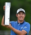 South Korean golfer An Byeong-hun celebrates his win at the BMW Championship. (Adam Davy/PA via AP)