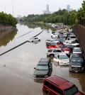 Motorists are stranded along I-45 along North Main in Houston after storms flooded the area, Tuesday, May 26, 2015. Overnight heavy rains caused flooding closing some portions of major highways in the Houston area. (Cody Duty/Houston Chronicle via AP)