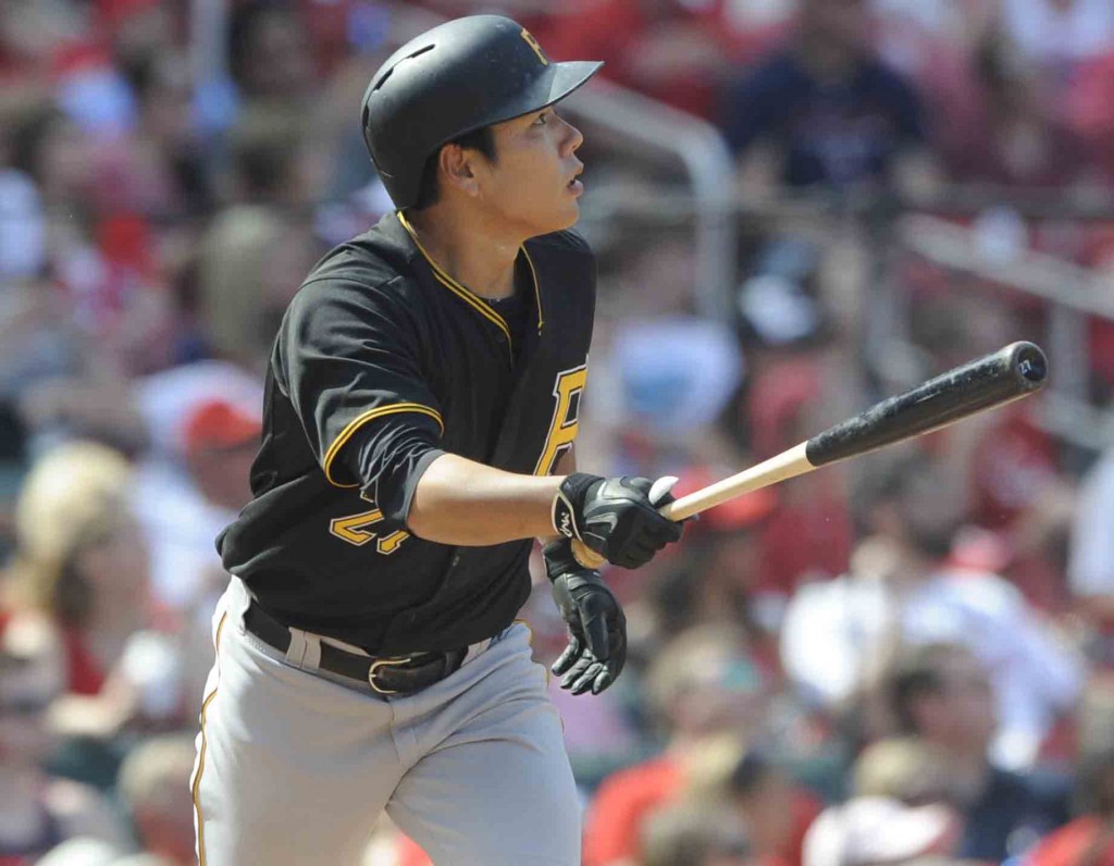 Pittsburgh Pirates' Kang Jung-ho, of South Korea, watches his solo home run against the St. Louis Cardinals in the ninth inning in a baseball game, Sunday, May 3, 2015, at Busch Stadium in St. Louis. (AP Photo/Bill Boyce)