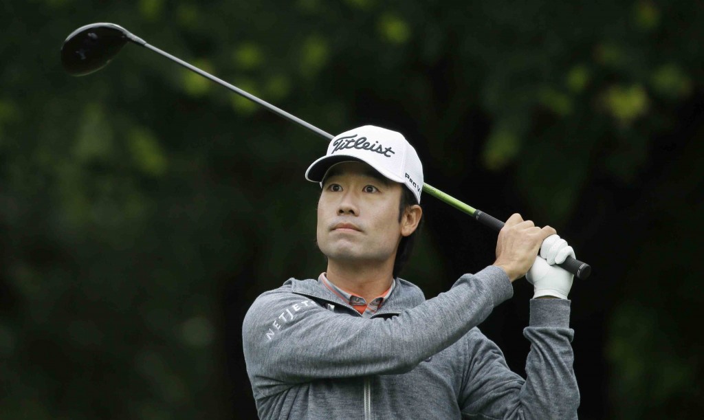 Kevin Na watches his tee shot on the 12th hole during the first round of the Colonial golf tournament, Thursday, May 21, 2015, in Fort Worth, Texas. (AP Photo/LM Otero)