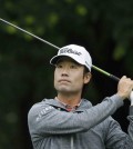Kevin Na watches his tee shot on the 12th hole during the first round of the Colonial golf tournament, Thursday, May 21, 2015, in Fort Worth, Texas. (AP Photo/LM Otero)