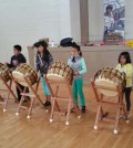 Students follow the instruction of teacher Lee Young-sook during the first lesson of Salinas' new Korean culture education program.