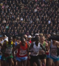 North Korean spectators watch from the stands of Kim Il-sung Stadium as runners line up at the start of the Mangyongdae Prize International Marathon in Pyongyang, North Korea. (AP Photo/David Guttenfelder)