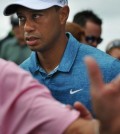 Tiger Woods leaves a practice round for The Players Championship golf tournament in Ponte Vedra Beach, Fla., Tuesday, May 5, 2015. (William Dickey/The Florida Times-Union via AP)