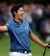 South Korea's Byeong Hun An gestures, after winning the 2015 BMW PGA Golf Championship, at the Wentworth golf club, in Virginia Water, England, Sunday May 24, 2015. (Adam Davy/PA via AP)