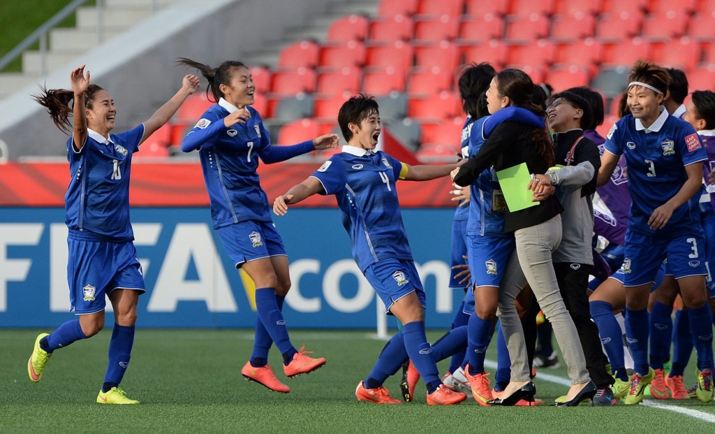 Thailand players run to the sidelines to celebrate after a score against Ivory Coast during the first half of a FIFA Women's World Cup soccer match in Ottawa, Ontario, Canada, on Thursday, June 11, 2015. (Sean Kilpatrick/The Canadian Press via AP)