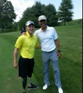 Jason Pak, left, and President Barack Obama at TPC Potomac golf club Saturday.