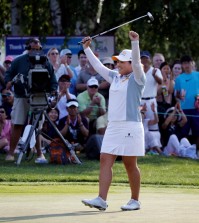 Park Inbee, of South Korea, celebrates after winning the KPMG Women's PGA golf championship at Westchester Country Club in Harrison, N.Y., Sunday, June 14, 2015. (AP Photo/Julio Cortez)