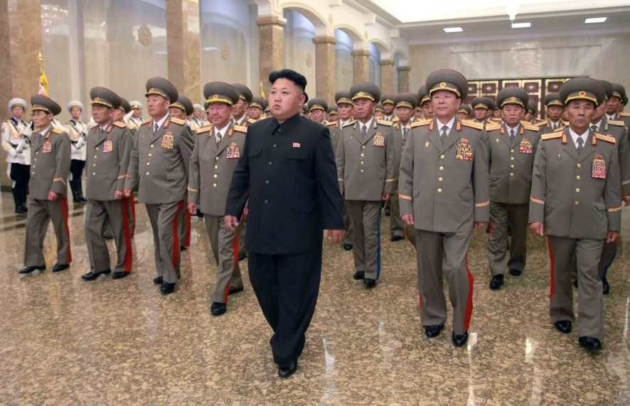 North Korean leader Kim Jong-un, center, visits the Kumsusan Palace of the Sun. (Yonhap/KCNA)