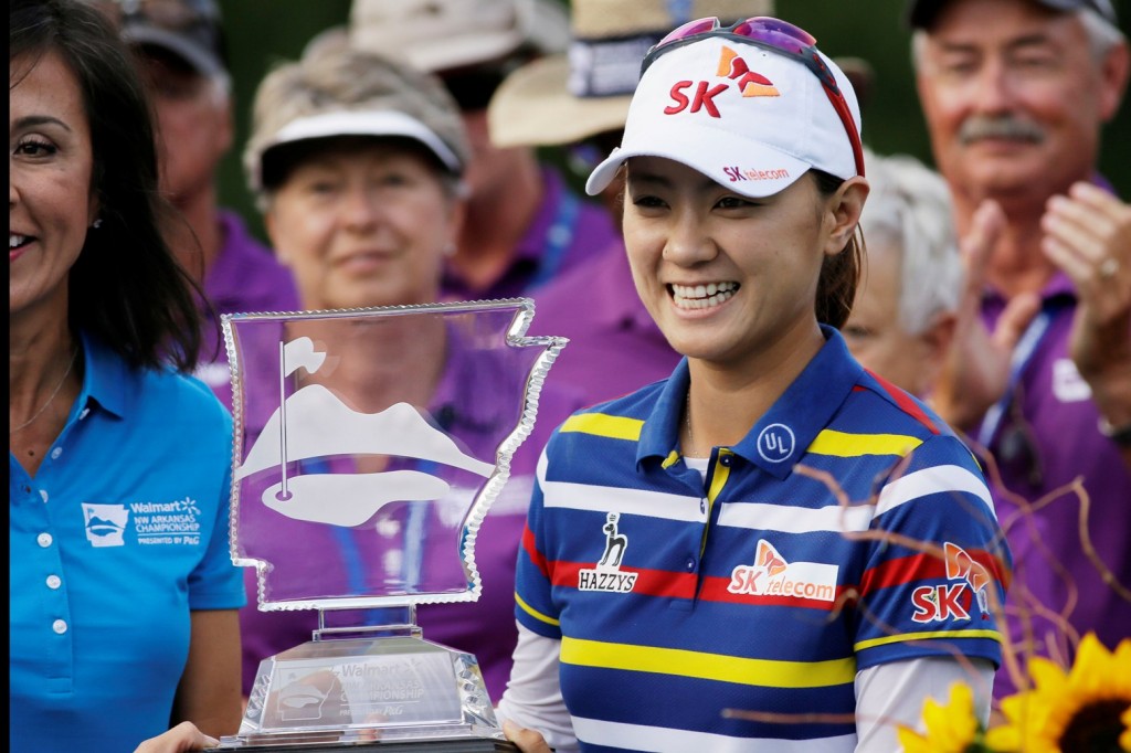 Na Yeon Choi, of South Korea, holds trophy after winning the NW Arkansas Championship LPGA golf tournament at Pinnacle Country Club in Rogers, Ark., Sunday, June 28, 2015. (AP Photo/Danny Johnston)