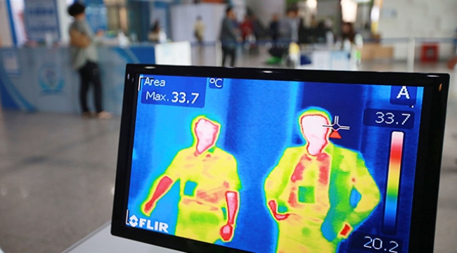 A thermal camera monitor shows the body temperature of visitors during the Job Fairs in Seoul, South Korea Friday, June 5, 2015. Sales of surgical masks surge amid fears of the deadly, poorly understood virus. Airlines announce "intensified sanitizing operations." More than 1,100 schools close and 1,600 people - and 17 camels in zoos - are quarantined. The current frenzy in South Korea over MERS brings to mind the other menacing diseases to hit Asia over the last decade - SARS, which killed hundreds, and bird flu. (Yonhap) 