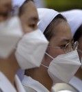 South Korean nuns wearing mask as a precaution against MERS, Middle East Respiratory Syndrome, virus. (AP Photo/Lee Jin-man)