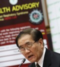 Public Health Minister Rajata Rajatanavin talks to reporters during press conference in Bangkok, Thailand Thursday, June 18, 2015. Thailand says it has confirmed its first known case of the deadly MERS virus, a man who arrived from a Middle Eastern country for treatment of a heart condition. (AP Photo/Sakchai Lalit)