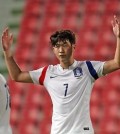 Son Heung-min of South Korea celebrates after scoring a goal against Myanmar in a World Cup qualifying match in Bangkok on June 16, 2015. (Yonhap)