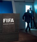 FIFA President Sepp Blatter leaves after speaking at a press conference at the FIFA headquarters in Zurich, Switzerland, Tuesday, June 2, 2015. Sepp Blatter says he will resign from his position amid corruption scandal and is promising to call for fresh elections to choose a successor. (Ennio Leanza/Keystone via AP)