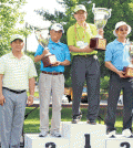 Leaders of the Washington, D.C.,  team at the 18th Korean American National Sports Festival hold up the No. 1 trophy.