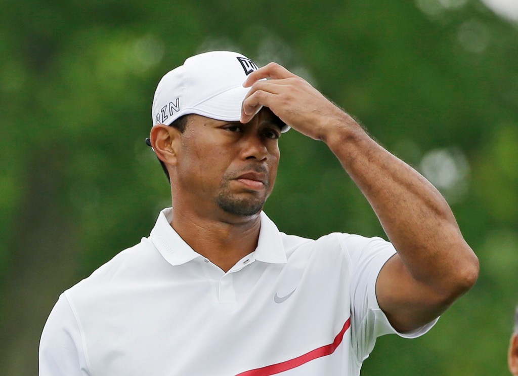 Tiger Woods waits to tee off on the 11th hole during the third round of the Memorial golf tournament Saturday, June 6, 2015, in Dublin, Ohio. (AP Photo/Darron Cummings)