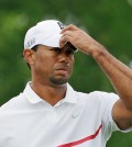 Tiger Woods waits to tee off on the 11th hole during the third round of the Memorial golf tournament Saturday, June 6, 2015, in Dublin, Ohio. (AP Photo/Darron Cummings)