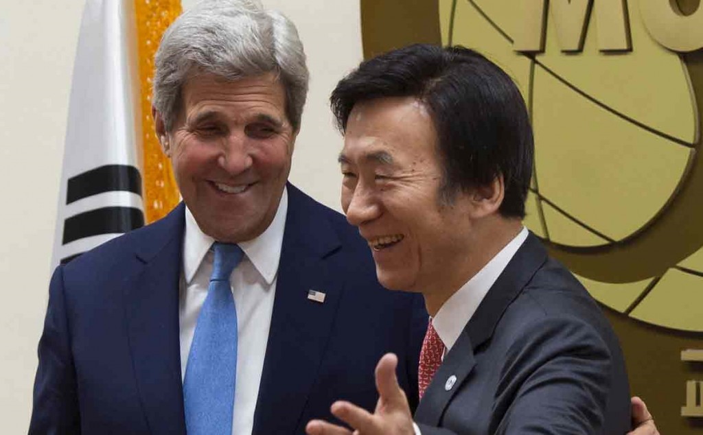 South Korean Foreign Minister Yun Byung-se, right, and U.S. Secretary of State John Kerry greet each other prior to a meeting at the Ministry of Foreign Affairs in Seoul, South Korea. Yun believes that increased pressure should be put on North Korea for denuclearization talks. (Saul Loeb/Pool Photo via AP)