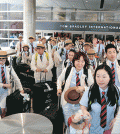 South Korean athletes and staff arrive at Los Angeles International Airport Tuesday to participate in the Special Olympics World Games. (Korea Times)