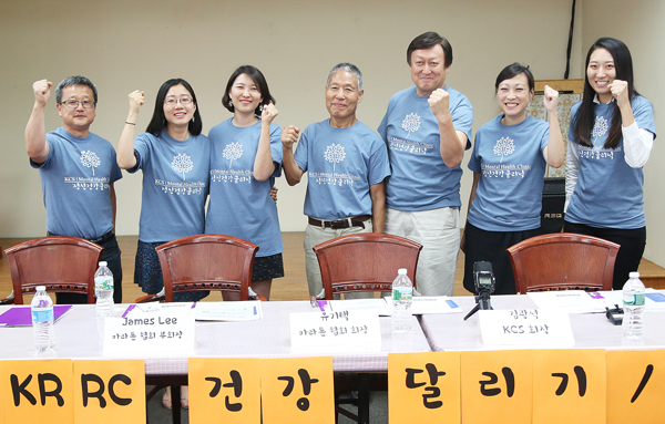 Leaders of Korean Community Services of Metropolitan New York and the Korean Road Runners Club promote upcoming three-mile marathons to raise money for a new mental health clinic.