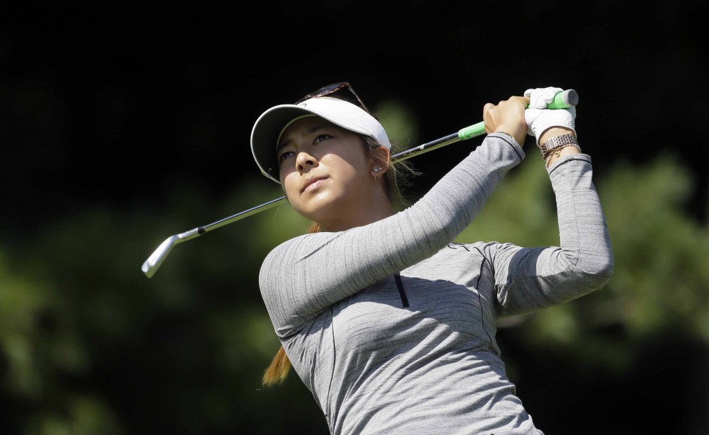 Alison Lee watches her drive on the second hole during the second round of the Meijer LPGA Classic golf tournament Friday, July 24, 2015, in Belmont, Mich. (AP Photo/Carlos Osorio)