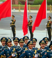 Members of a Chinese honor guard take part in a welcome ceremony for Belgium King Philippe in Beijing, Tuesday, June 23, 2015. Chinese organizers of a parade marking the end of World War II were keeping mum Tuesday over the sensitive question of which foreign countries' militaries had been invited to take part. (AP Photo/Ng Han Guan)