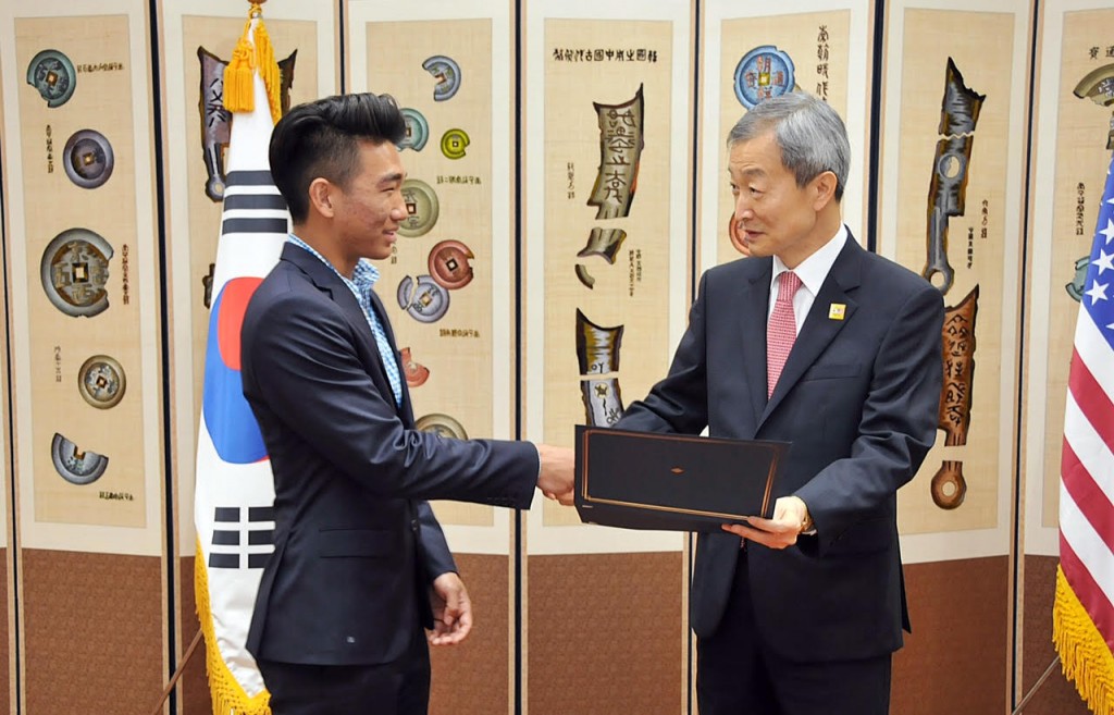 Incoming Harvard University freshman Albert Choi gets congratulated by the Ambassador of the Republic of Korea in Washington D.C. (Courtesy of Albert Choi/South Korean Embassy)