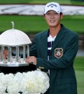 Danny Lee poses with the trophy after winning the Greenbrier Classic golf tournament at Greenbrier Resort in White Sulphur Springs, W.Va., Sunday, July 5, 2015. (AP Photo/Chris Tilley)