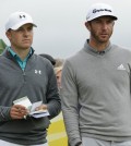 United States’ Jordan Spieth, left, and United States’ Dustin Johnson speak before playing from the 15th tee during the first round of the British Open Golf Championship at the Old Course, St. Andrews, Scotland, Thursday, July 16, 2015. (AP Photo/David J. Phillip)