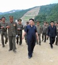 North Korea's leader Kim Jong-un visits the construction site of a ski resort being built on Masik Pass. (KCNA/Yonhap)