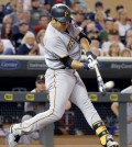 Pittsburgh Pirates' Jung Ho Kang hits a solo home run off Minnesota Twins relief pitcher Glen Perkins during the ninth inning of a baseball game in Minneapolis, Tuesday, July 28, 2015. The Pirates won 8-7. (AP Photo/Ann Heisenfelt)