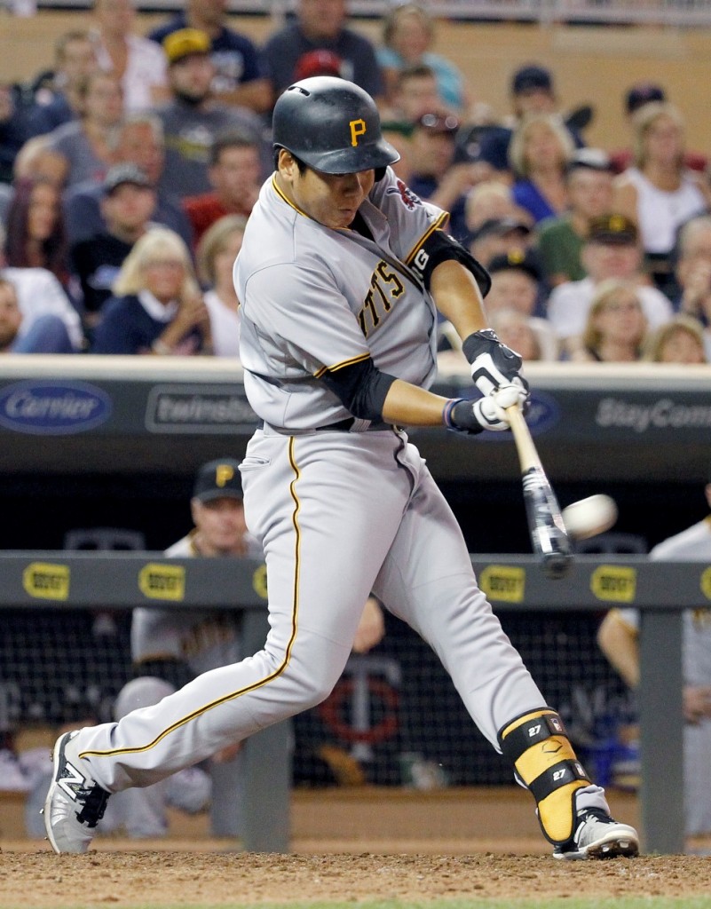 Pittsburgh Pirates' Jung Ho Kang hits a solo home run off Minnesota Twins relief pitcher Glen Perkins during the ninth inning of a baseball game in Minneapolis, Tuesday, July 28, 2015. The Pirates won 8-7. (AP Photo/Ann Heisenfelt)