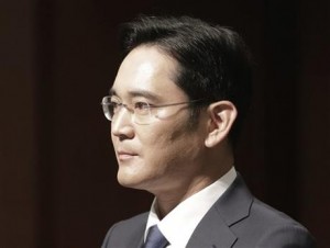 In this June 23, 2015, Lee Jae-yong, vice chairman of Samsung Electronics Co., arrives to attend a press conference at the company's headquarters in Seoul, South Korea. A vote on combining companies in the Samsung empire is pitting South Korea’s richest family against small shareholders and foreign investors. Shareholders at Samsung C&T will vote Friday, July 17 on the proposed takeover of the company by another Samsung company, Cheil Industries. (AP Photo/Ahn Young-joon)