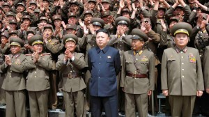 North Korean leader Kim Jong-un (C) poses with troops of Korean People's Army Unit 405. (Yonhap/KCNA)