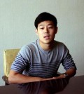 Won Moon Joo, a South Korean student at New York University, is interviewed at the Koryo Hotel in Pyongyang, North Korea Tuesday, July 14, 2015. Joo, who is being detained in North Korea says he hopes to be released soon and has told his family not to worry too much about him. Joo was presented to the media in North Korea’s capital, Pyongyang, on Tuesday. (AP Photo/Kim Kwang Hyon)