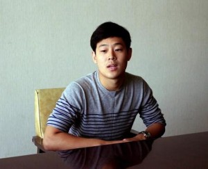 Won Moon Joo, a South Korean student at New York University, is interviewed at the Koryo Hotel in Pyongyang, North Korea Tuesday, July 14, 2015. Joo, who is being detained in North Korea says he hopes to be released soon and has told his family not to worry too much about him. Joo was presented to the media in North Korea’s capital, Pyongyang, on Tuesday. (AP Photo/Kim Kwang Hyon)