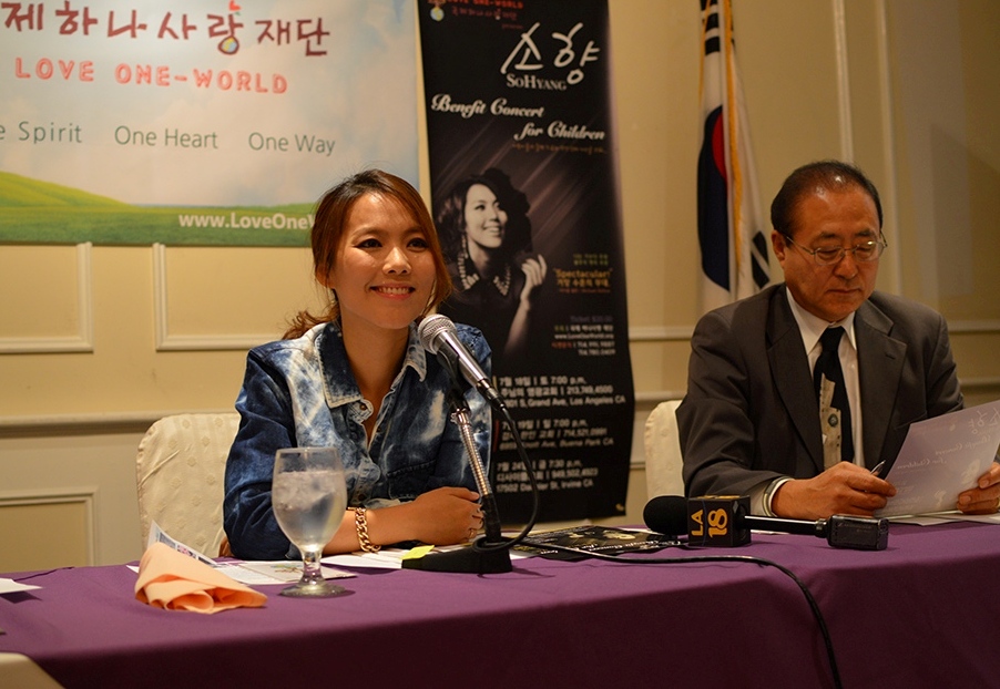 Sohyang, left, and Love One-World President Lim Deok-soon held a press conference Thursday to discuss an upcoming series of benefit concerts. (Angelina Widener/Korea Times)