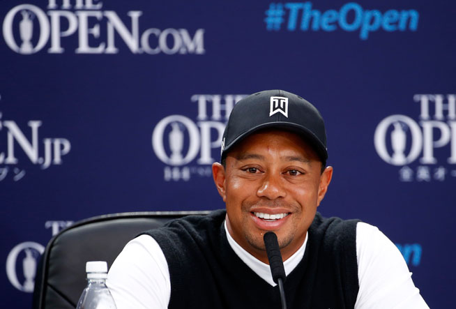 United States’ Tiger Woods speaks during a news conference ahead of a practice round at the British Open Golf Championship at the Old Course, St. Andrews, Scotland, Tuesday, July 14, 2015. (AP Photo/Jon Super)