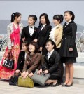 Young North Korean women wearing high heels and holding designer bags in Pyongyang. The photo, published in "Dazed & Confused" was taken by freelancer Lu-Hai Liang, who visited the North this year. (Yonhap)