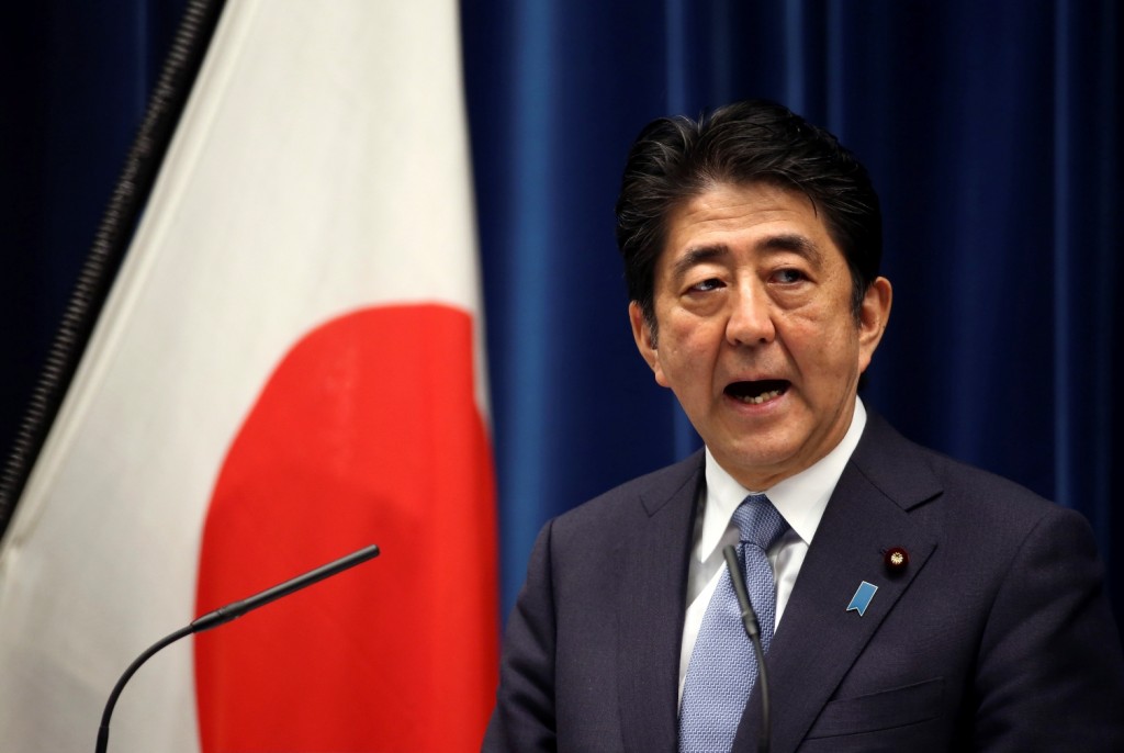 Japanese Prime Minister Shinzo Abe delivers a statement to mark the 70th anniversary of the end of World War II during a press conference at his official residence in Tokyo Friday, Aug. 14, 2015. Abe has expressed "profound grief" for all who perished in World War II in a statement marking the 70th anniversary of the country's surrender. (AP Photo/Eugene Hoshiko)