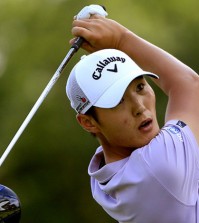 Danny Lee, of New Zealand, watches his tee shot on the second hole during the third round of the Bridgestone Invitational golf tournament in Akron, Ohio, Saturday, Aug. 8, 2015. (AP Photo/Phil Long)