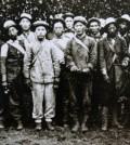 Korean immigrants who worked at an orange farm, including Dosan Ahn Chang-ho, second from left in front row, got together to pose for a photo. It is believe to be taken at Alta Cresta Grove Farm in Riverside, California. (Korea Times file)