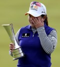 Tears of joy -- Inbee Park of South Korea wipes away tears holding the trophy after winning the Women's British Open golf championship at the Turnberry golf course in Turnberry, Scotland, Sunday, Aug. 2, 2015. (AP Photo/Scott Heppell)