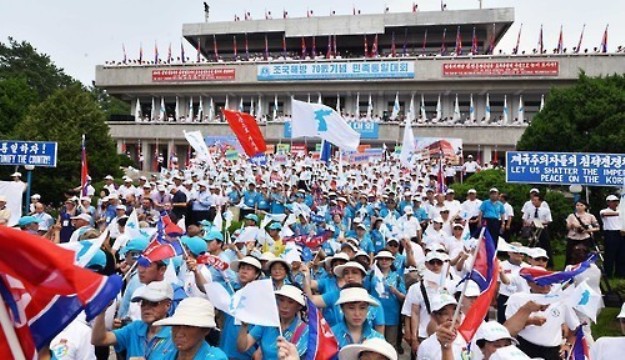 North Korea holds a closing event for its celebration of the 70th anniversary of Korea's independence from Japan's 1910-45 colonial rule at Panmunjom, the truce village inside the demilitarized zone that divides the two Koreas, on Aug. 15, 2015. (KCNA-Yonhap)